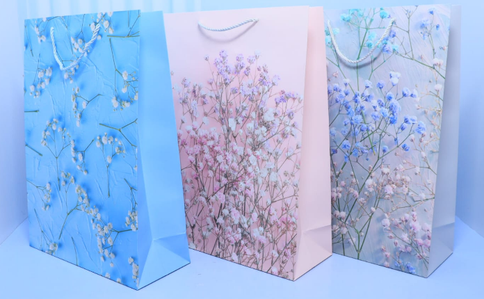 Executive extra-large A3 floral paper gift bags in sky blue soft pink and pastel blue priced at Ksh 400 in Nairobi