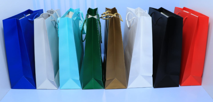 Executive A4 paper gift bags in 8 vibrant corporate colors priced at Ksh 300 in Nairobi