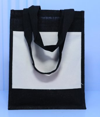 Black and white vertical A4 portrait jute tote bag with wide flat shoulder straps priced at Ksh 1000 in Nairobi