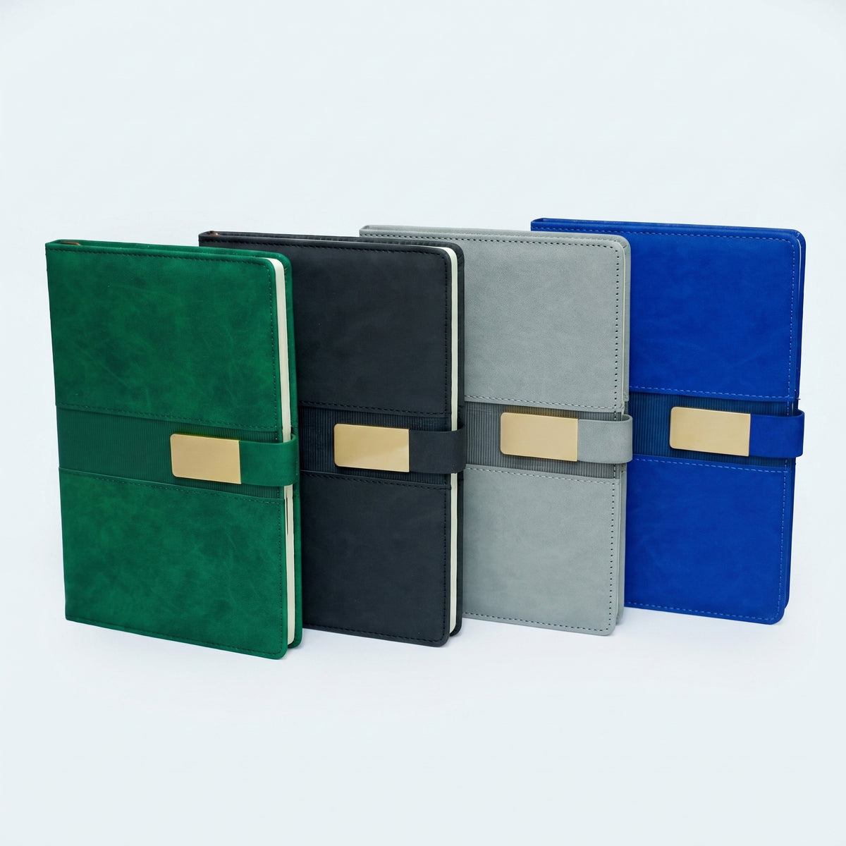 Custom debossed A5 leatherette notebooks with gold metal plate clasp by Print365 Kenya