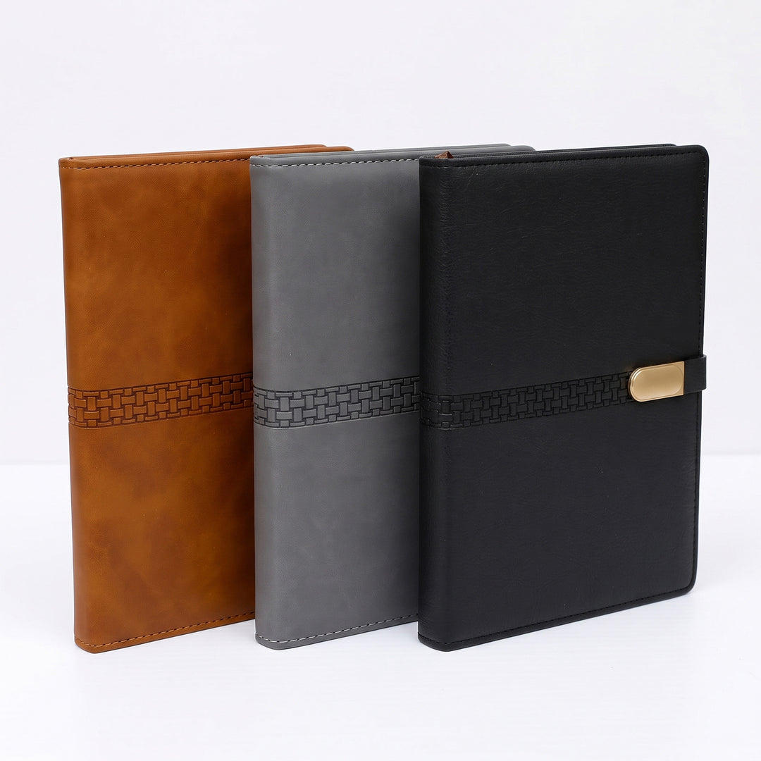 Custom debossed executive B5 leatherette notebooks with woven pattern band by Print365 Kenya