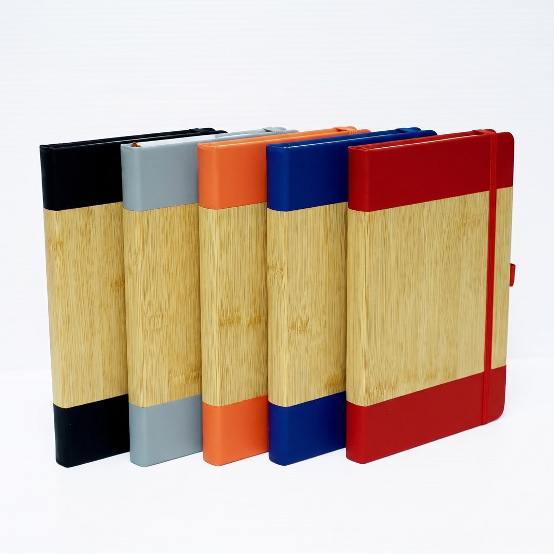 Executive A5 journals featuring natural bamboo panels and premium leatherette covers with pen loops by Print365 Nairobi