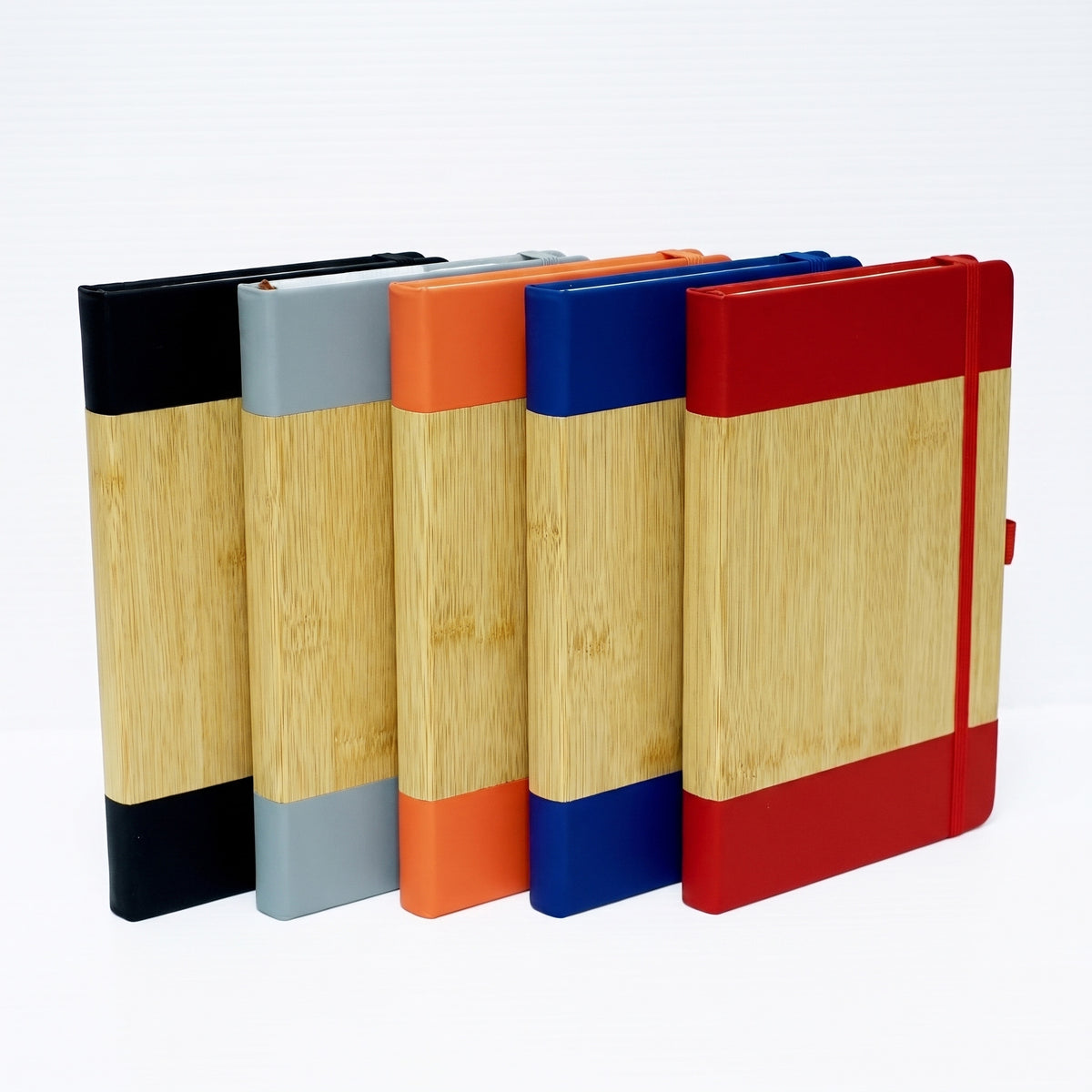 Executive A5 journals featuring natural bamboo panels and premium leatherette covers with pen loops by Print365 Nairobi