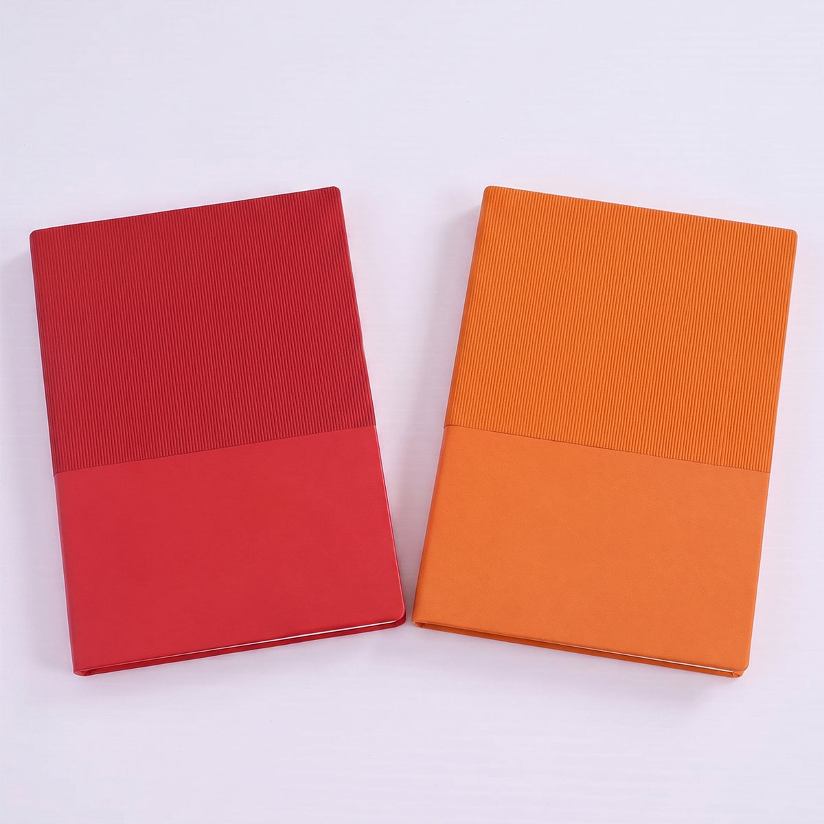 Custom debossed A5 dual-texture leatherette notebooks by Print365 Kenya