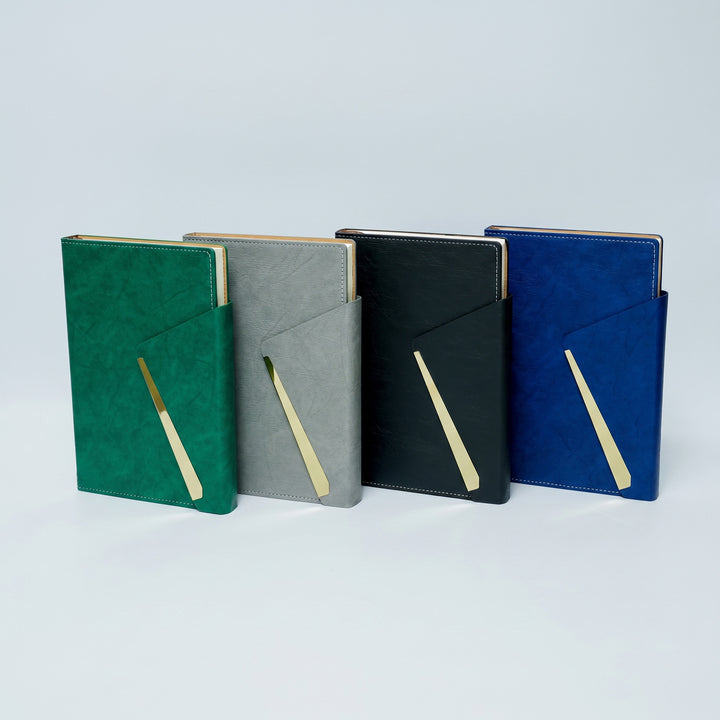 Custom debossed executive A5 leatherette notebooks with diagonal gold metal clip flaps by Print365 Kenya