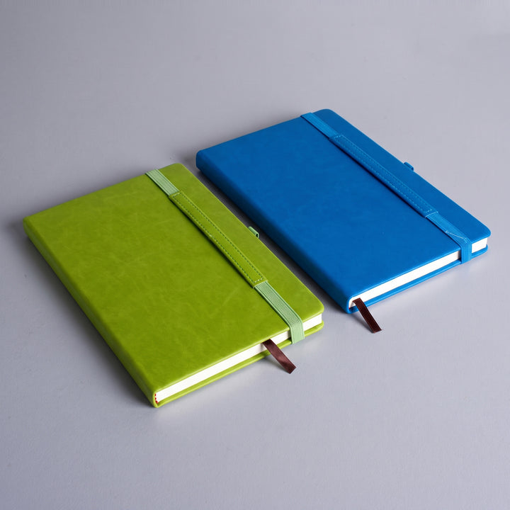 Custom debossed A5 leatherette notebooks with horizontal elastic closures by Print365 Kenya