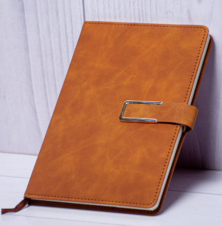 Custom branded executive A5 vintage leatherette notebook with silver metal buckle strap by Print365 Kenya