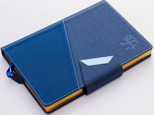 Custom debossed 2027 A5 executive diary with magnetic closure strap in royal blue by Print365 Kenya