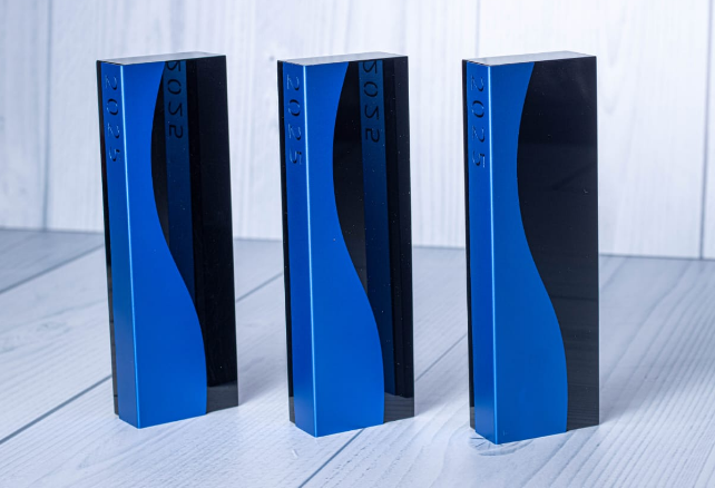 Custom laser-engraved blue and black wave monolith award trophy by Print365 Kenya