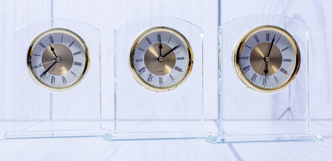 Custom laser-engraved arched optical clear glass crystal desk clock by Print365 Kenya