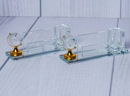 Custom laser-engraved clear crystal globe desk organizer with pen holder by Print365 Kenya