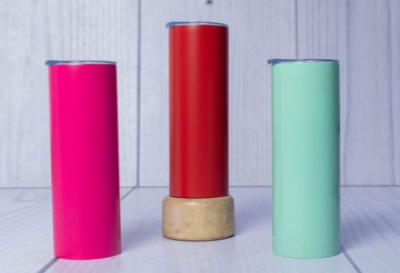 Display of custom powder-coated stainless steel skinny travel tumblers by Print365 Kenya