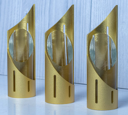 Custom laser-engraved gold metallic cylindrical crystal column award trophy by Print365 Kenya