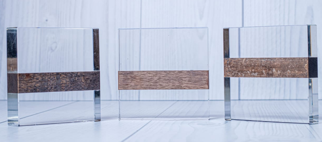 Custom laser-engraved optical crystal square block award with dark wood inlay by Print365 Kenya