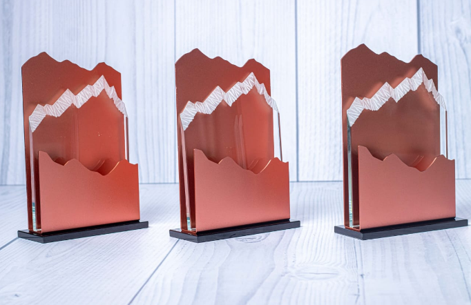Custom laser-engraved copper and glass Mountain Climber award trophy by Print365 Kenya