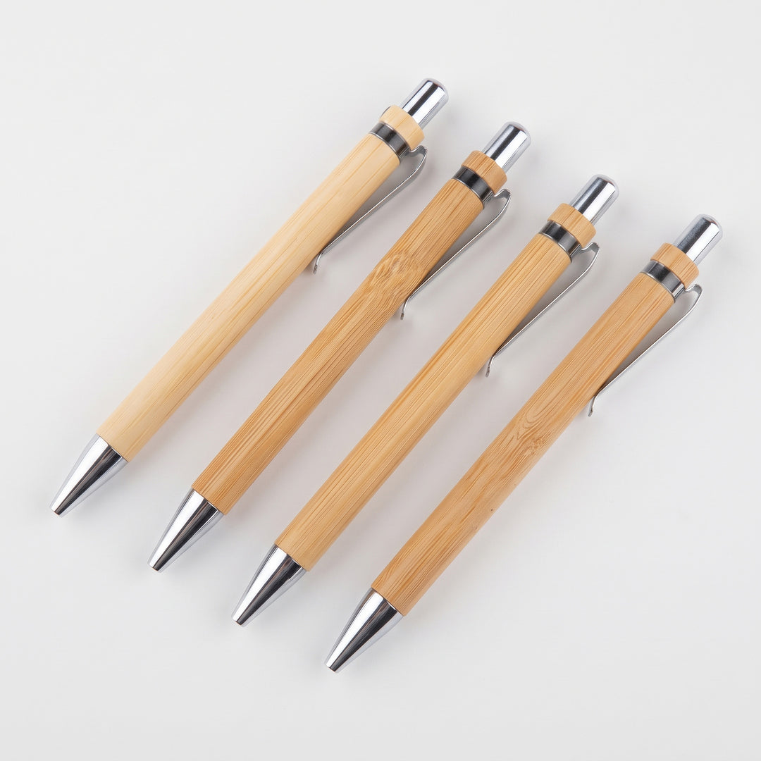 Custom branded sustainable bamboo ballpoint pens with sleek silver accents in Nairobi