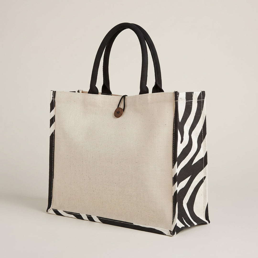 Custom screen-printed A3 zebra print buttoned jute and canvas bag by Print365 Kenya