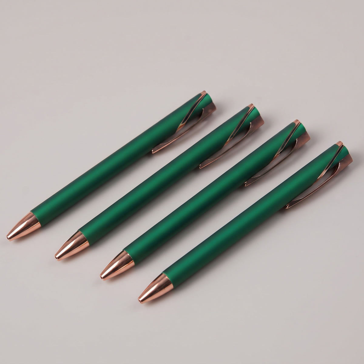 Custom laser-engraved executive matte metal pen with rose gold accents by Print365 Kenya