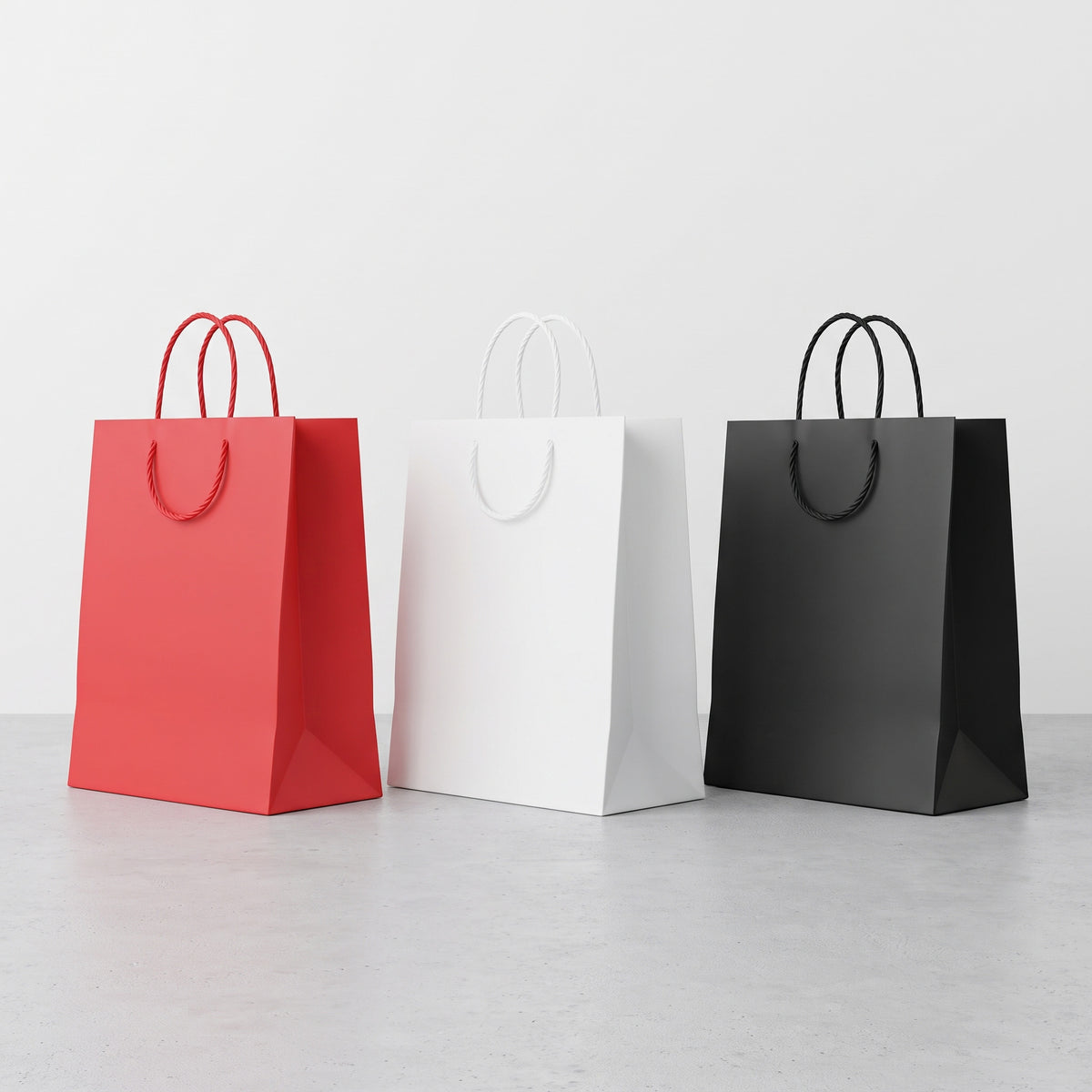 Executive plain portrait paper gift bags in A5 and B5 sizes in red white black priced from Ksh 300 in Nairobi
