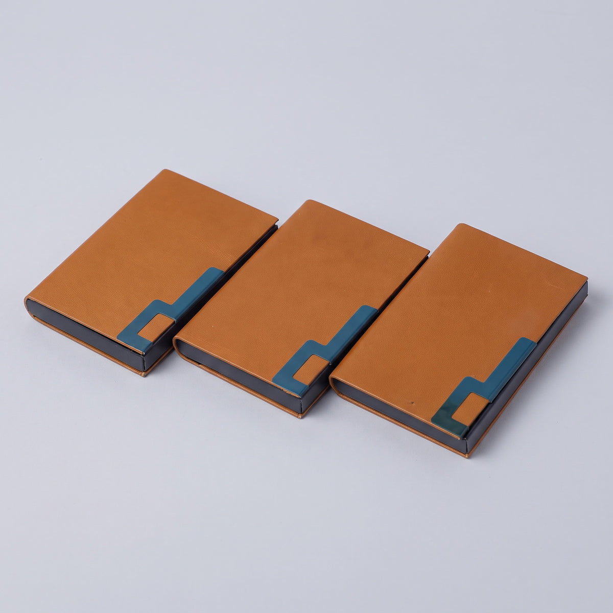 Custom laser-engraved tan brown and gunmetal grey executive business card holder by Print365 Kenya