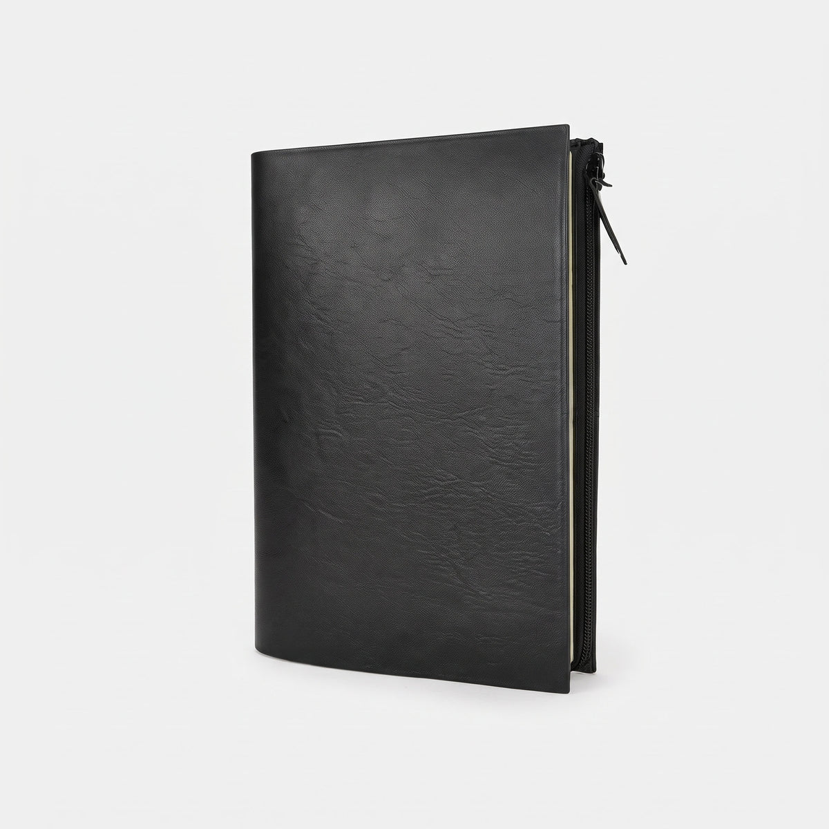 Custom debossed imported ARDON Santhome A5 black PU replaceable notebook with zipper cover by Print365 Kenya