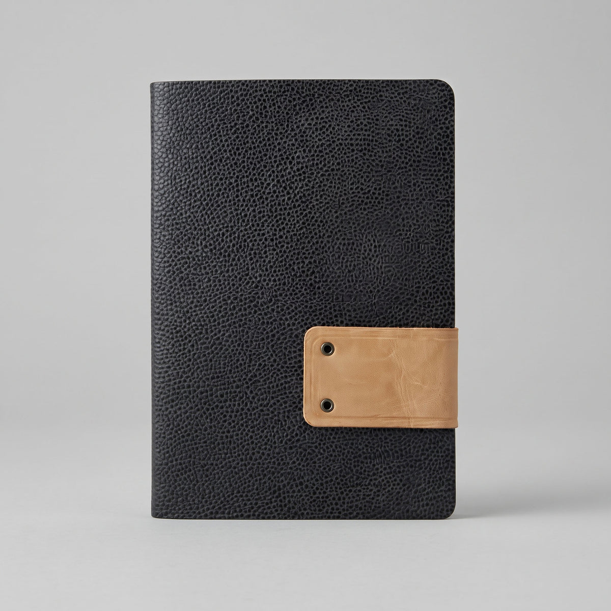 Custom debossed imported CESIS Santhome A5 black leatherette journal by Print365 Kenya   