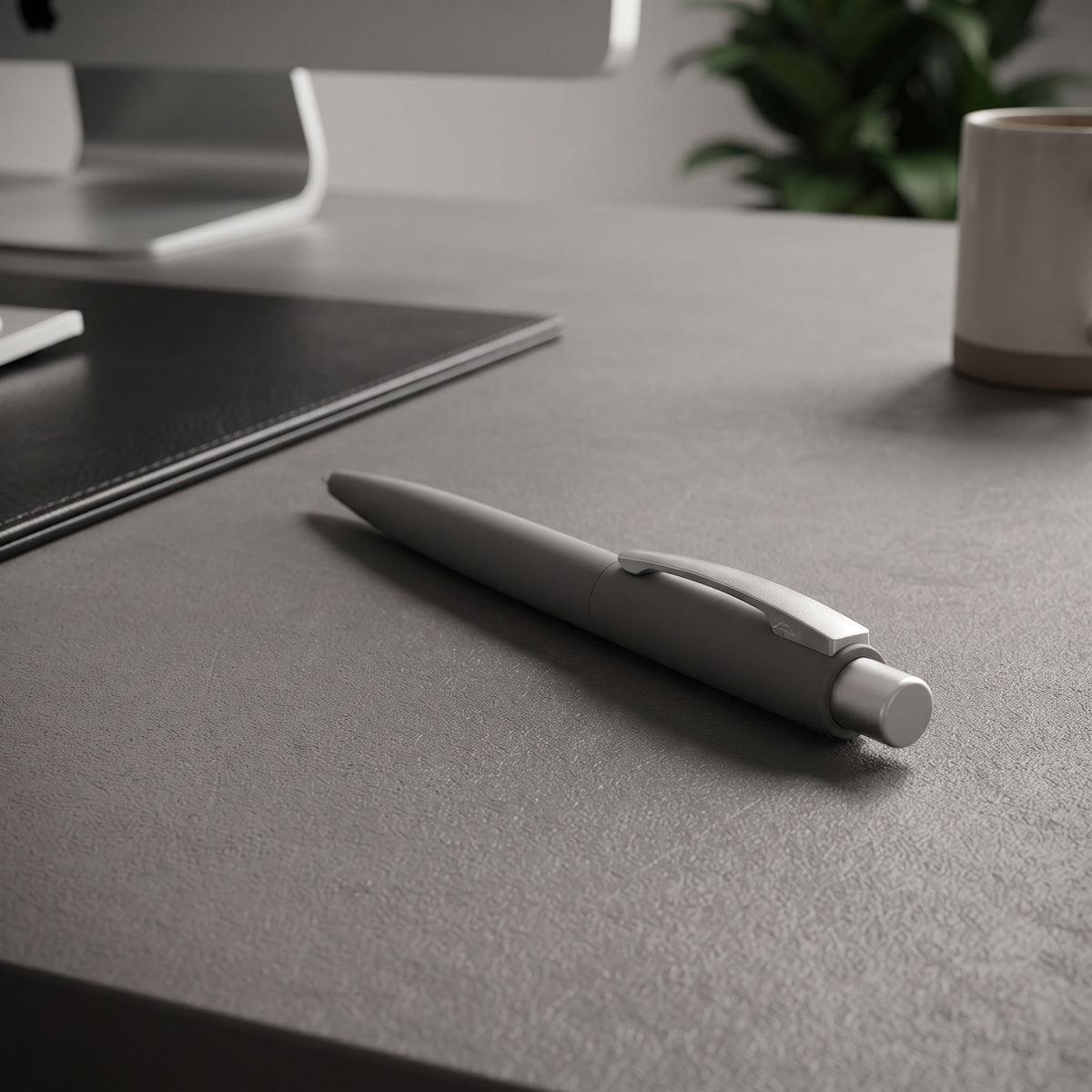 Custom pad-printed imported UMA LUMOS dark grey stone touch ballpoint pen by Print365 Kenya
