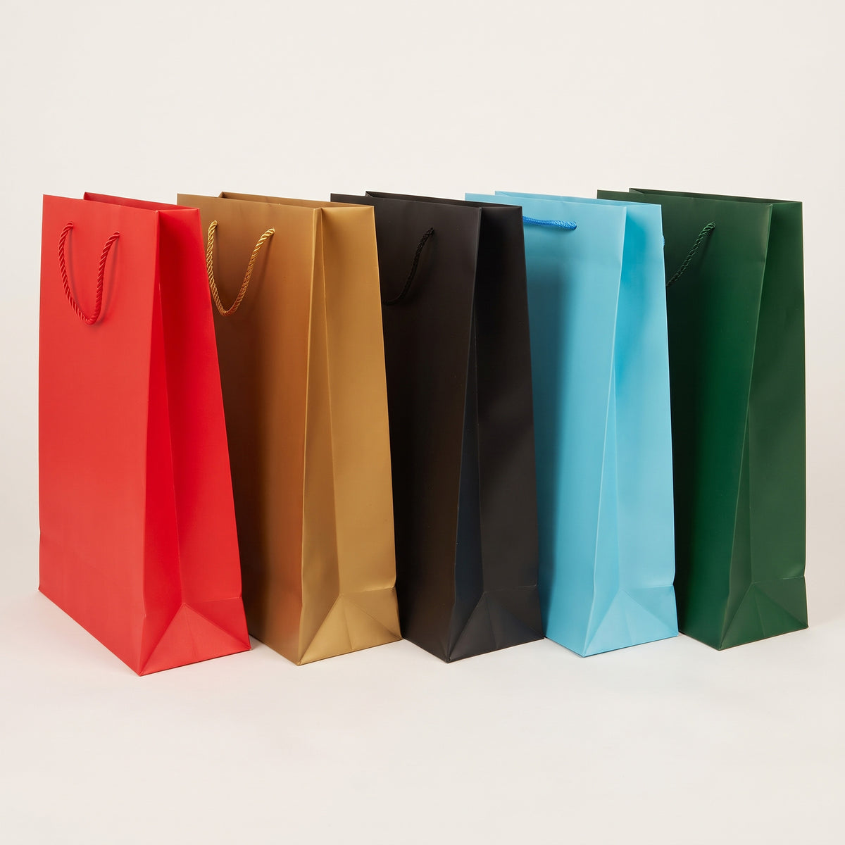 Executive A3 vertical paper gift bags in red gold black blue green priced at Ksh 400 in Nairobi