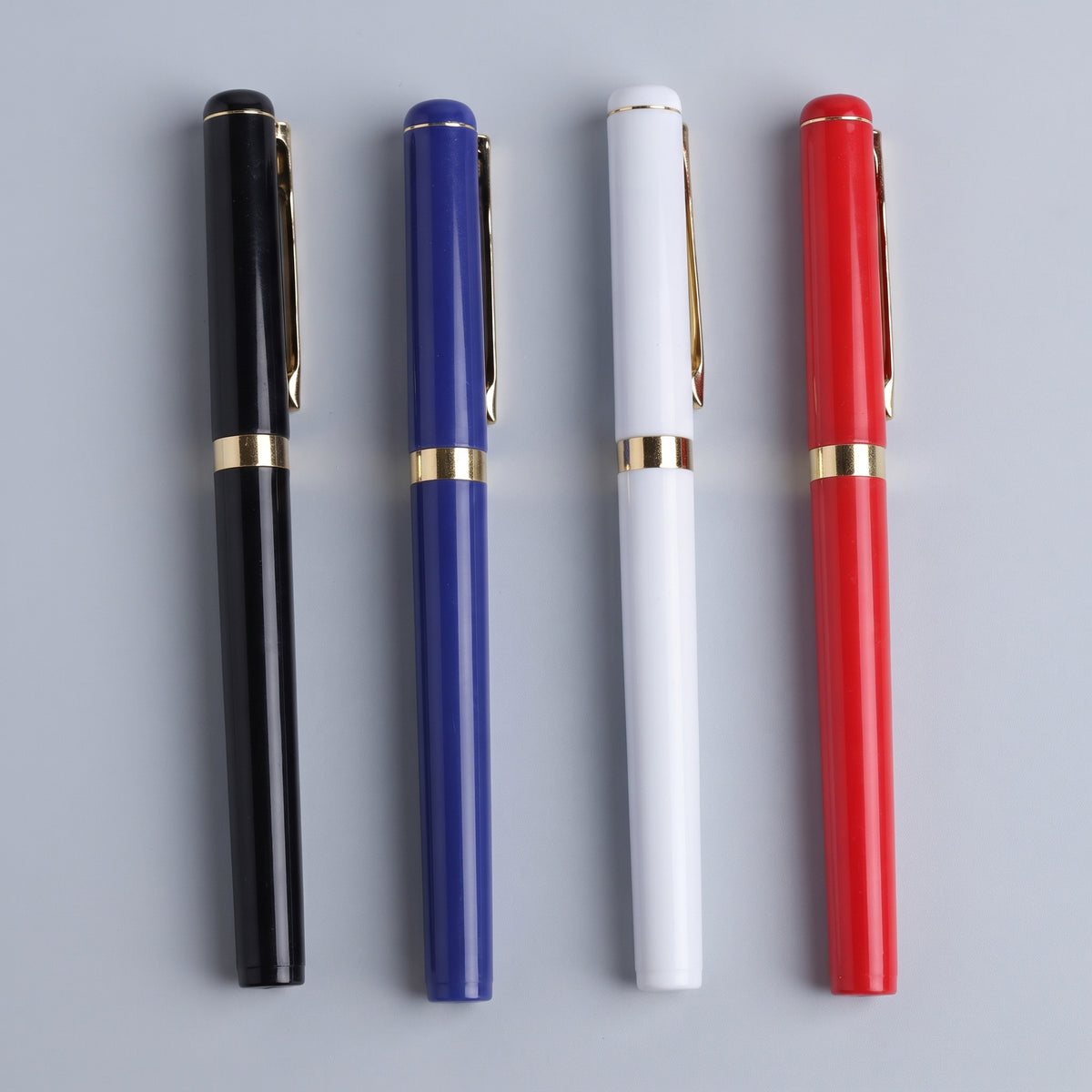 Custom printed executive plastic pens with gold trim accents by Print365 Kenya