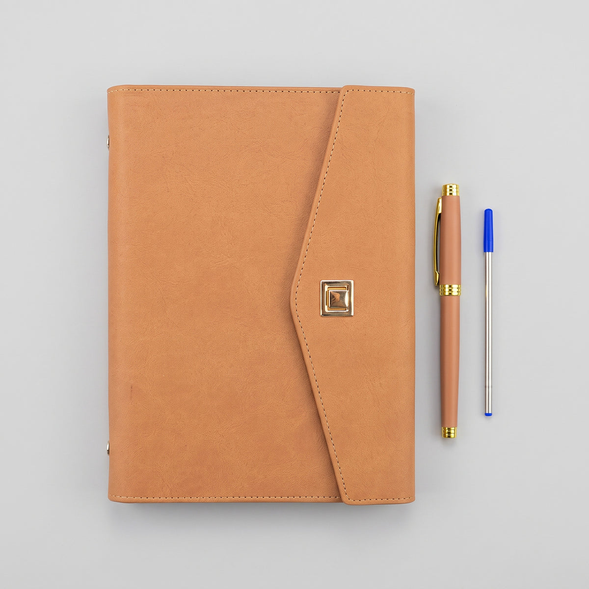 Custom branded executive gift set with A5 leatherette notebook and metal pen in Nairobi
