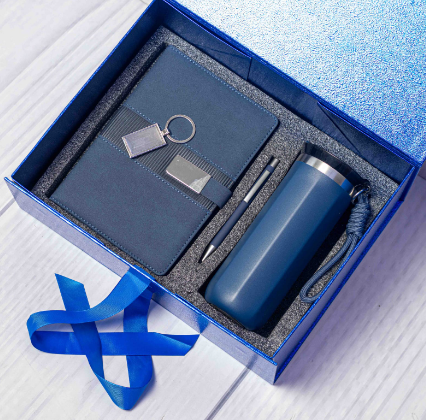 Custom laser-engraved executive 4-in-1 corporate gift set in royal blue with shimmer presentation box by Print365 Kenya