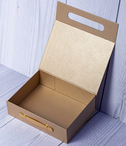 Custom foil-stamped metallic gold handle gift box open display by Print365 Kenya