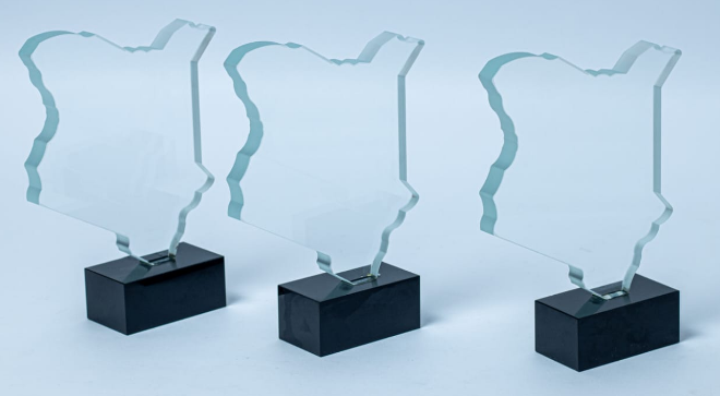 Custom laser-engraved Kenya map shape crystal award trophy with black base by Print365 Kenya