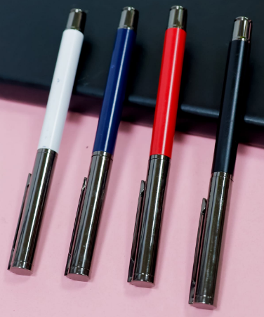 Custom laser-engraved executive metal pens with dark gunmetal chrome trim by Print365 Kenya