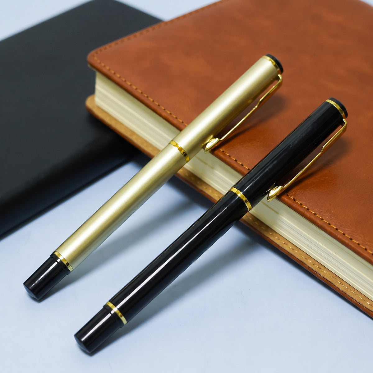 Executive slim metal ballpoint pens featuring polished gold trim and pocket clip done by Print365 Nairobi