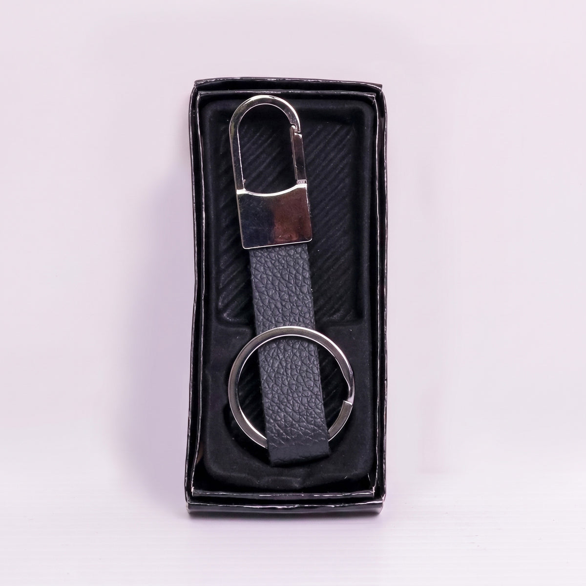 Custom laser-engraved executive metal and black leather keyholder by Print365 Kenya