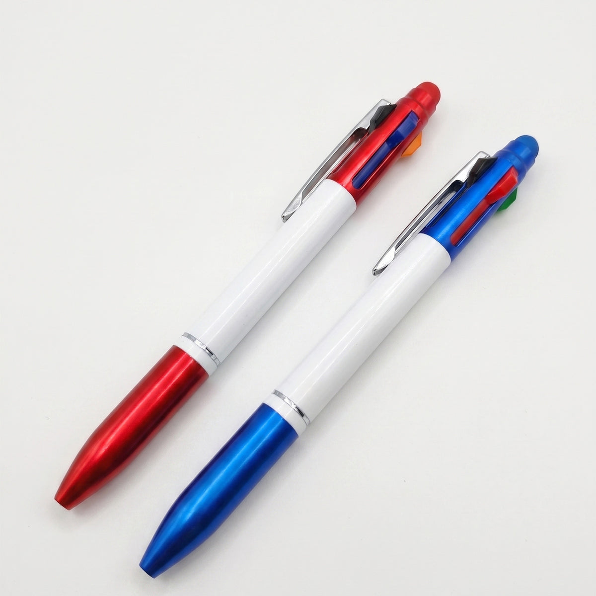 Executive multi-function shuttle ballpoint pens with vibrant colored rubber grip accents