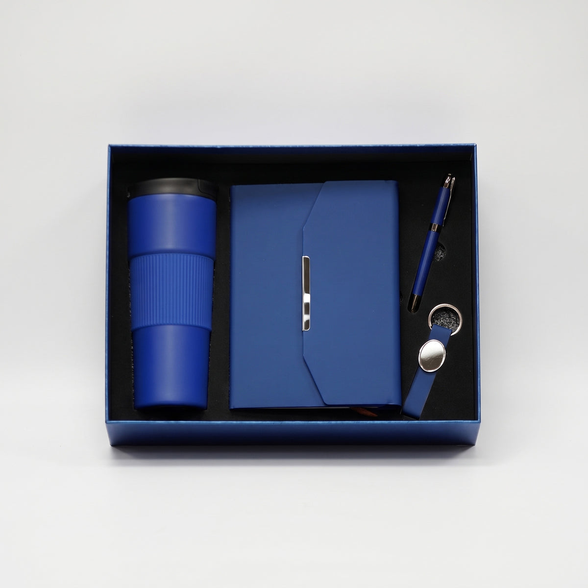Custom laser-engraved 4-piece executive gift set in royal blue with chrome accents by Print365 Kenya