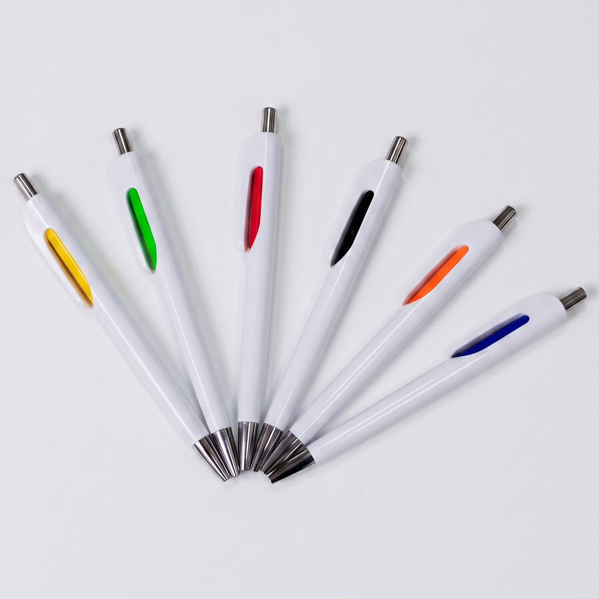 Custom printed white plastic promotional pens with metallic chrome tip and colored clip accents by Print365 Kenya