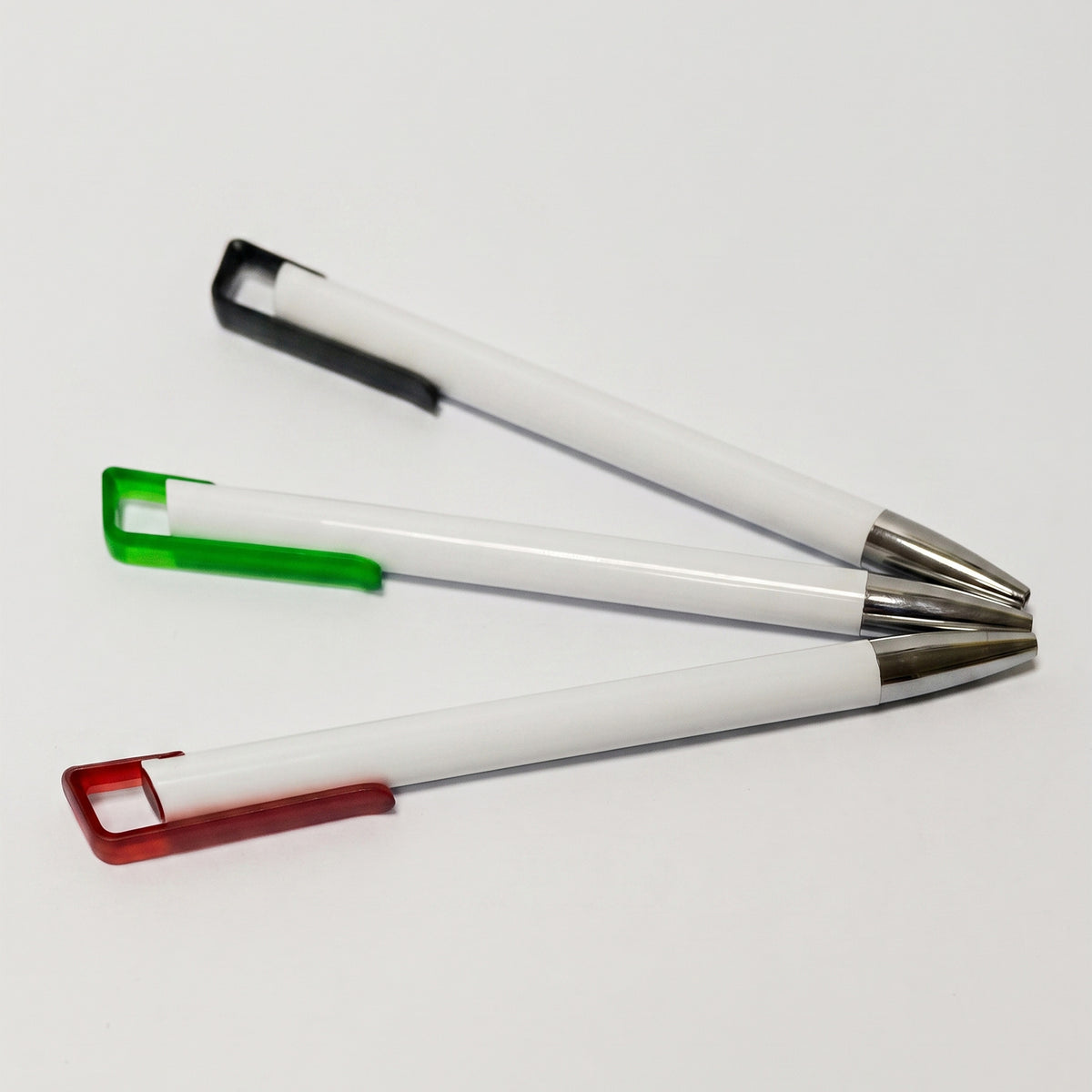 Custom printed white plastic promotional pens with metallic chrome tip and hollow square clip by Print365 Kenya