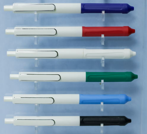 Custom printed white plastic promotional pens with silver clip and grooved grip by Print365 Kenya