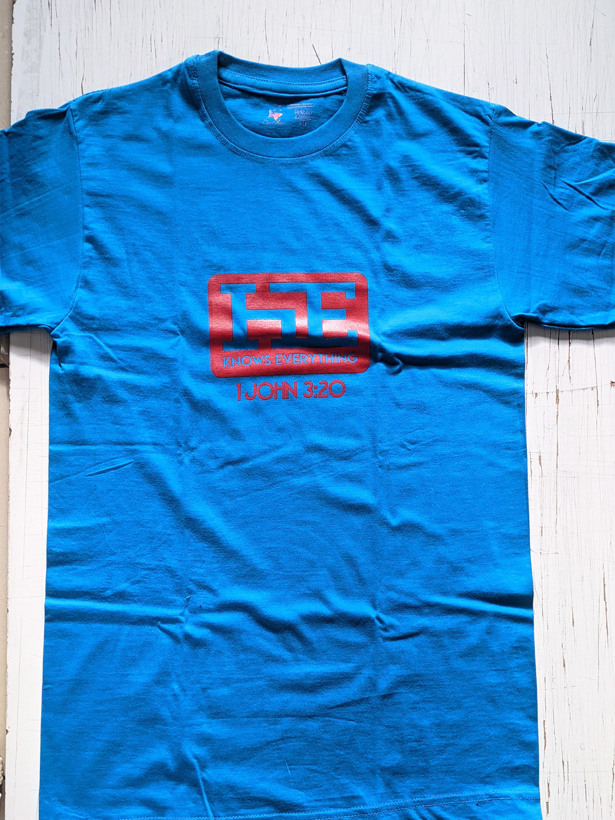 Custom printed round-neck 100% cotton t-shirt with full-color DTF logo print by Print365 Kenya