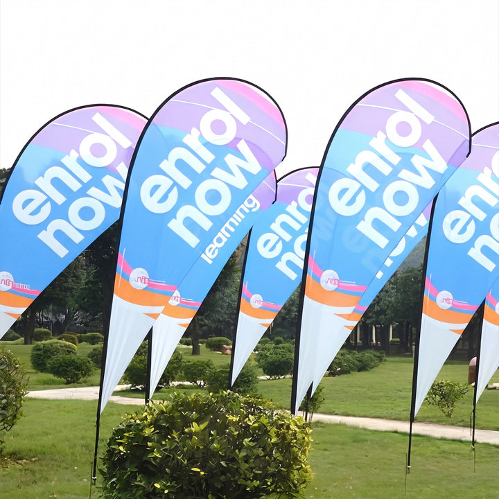 Multiple university teardrop banners advertising enrollment in Nairobi, Kenya