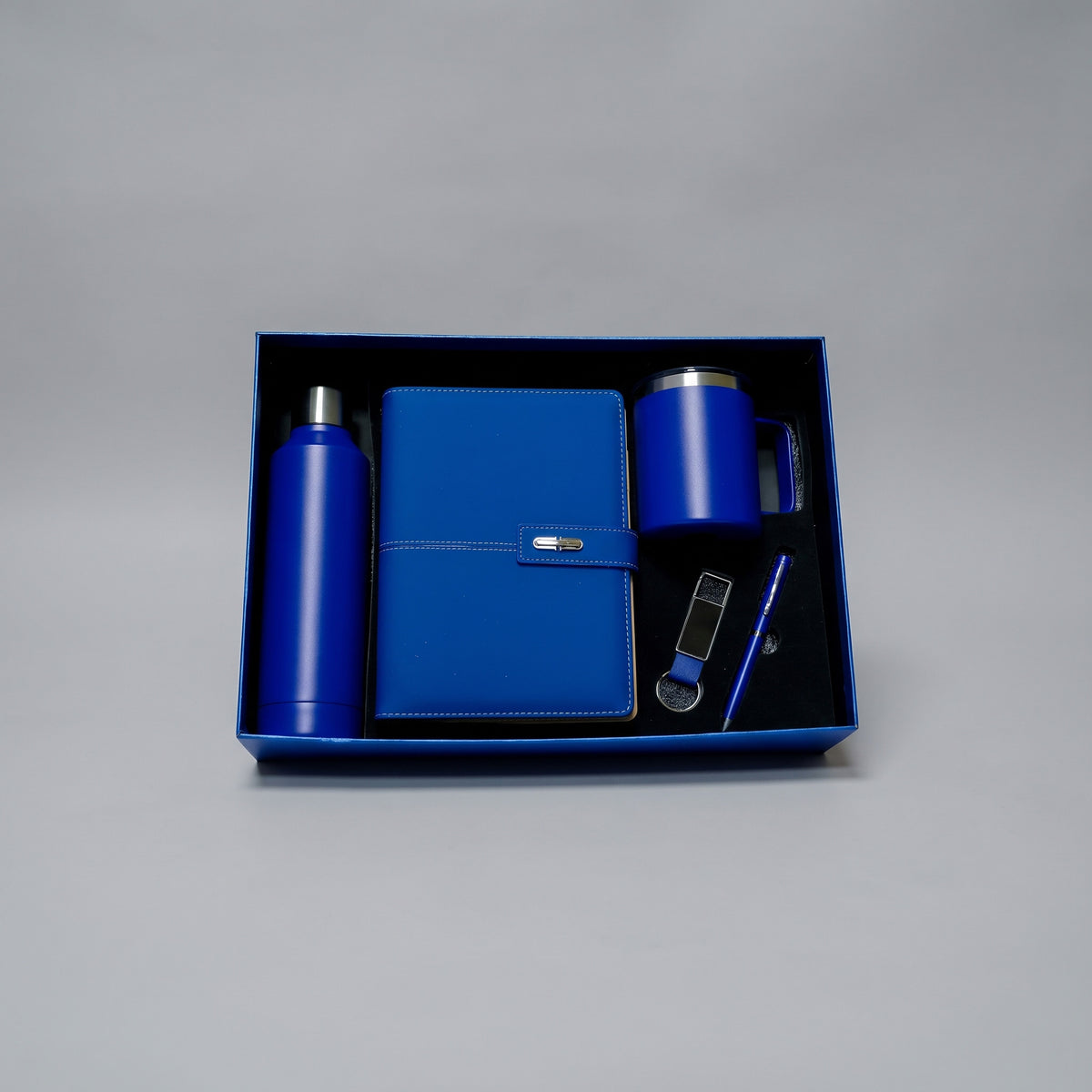 Custom laser-engraved 5-piece executive gift set in royal blue with silver accents by Print365 Kenya