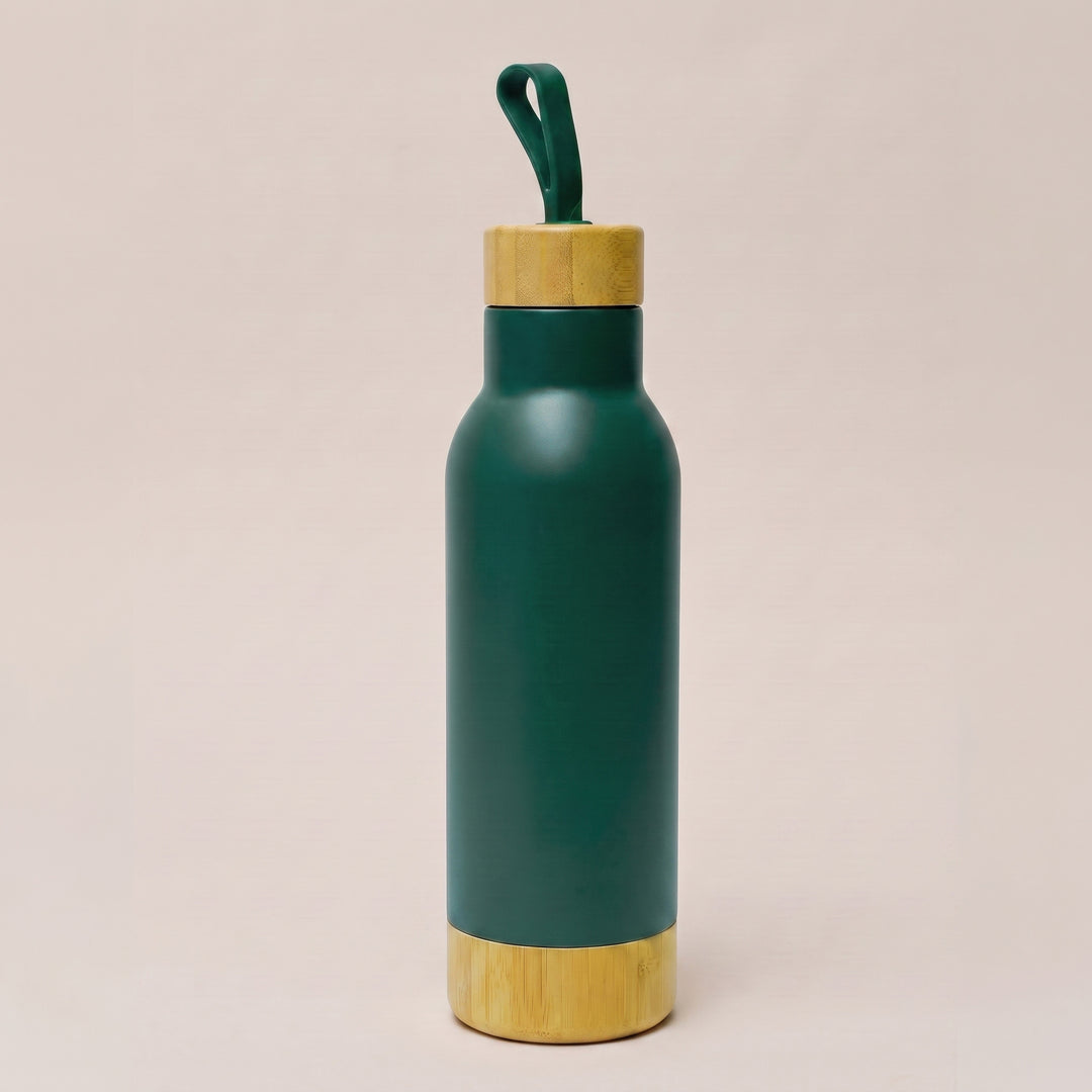 Custom laser-engraved dark green thermal flask with bamboo wood cap and base by Print365 Kenya