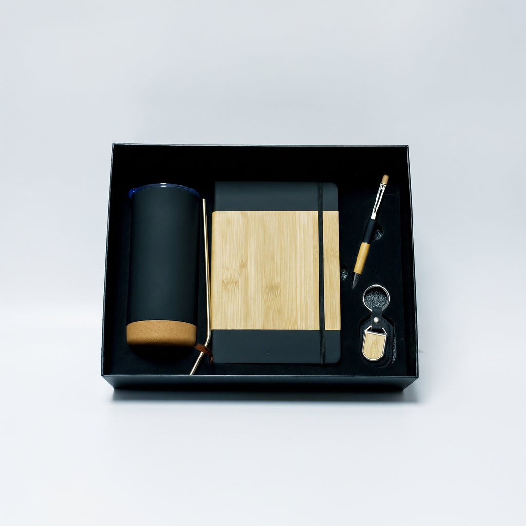 Custom laser-engraved 4-piece eco executive gift set in matte black, bamboo, and cork by Print365 Kenya