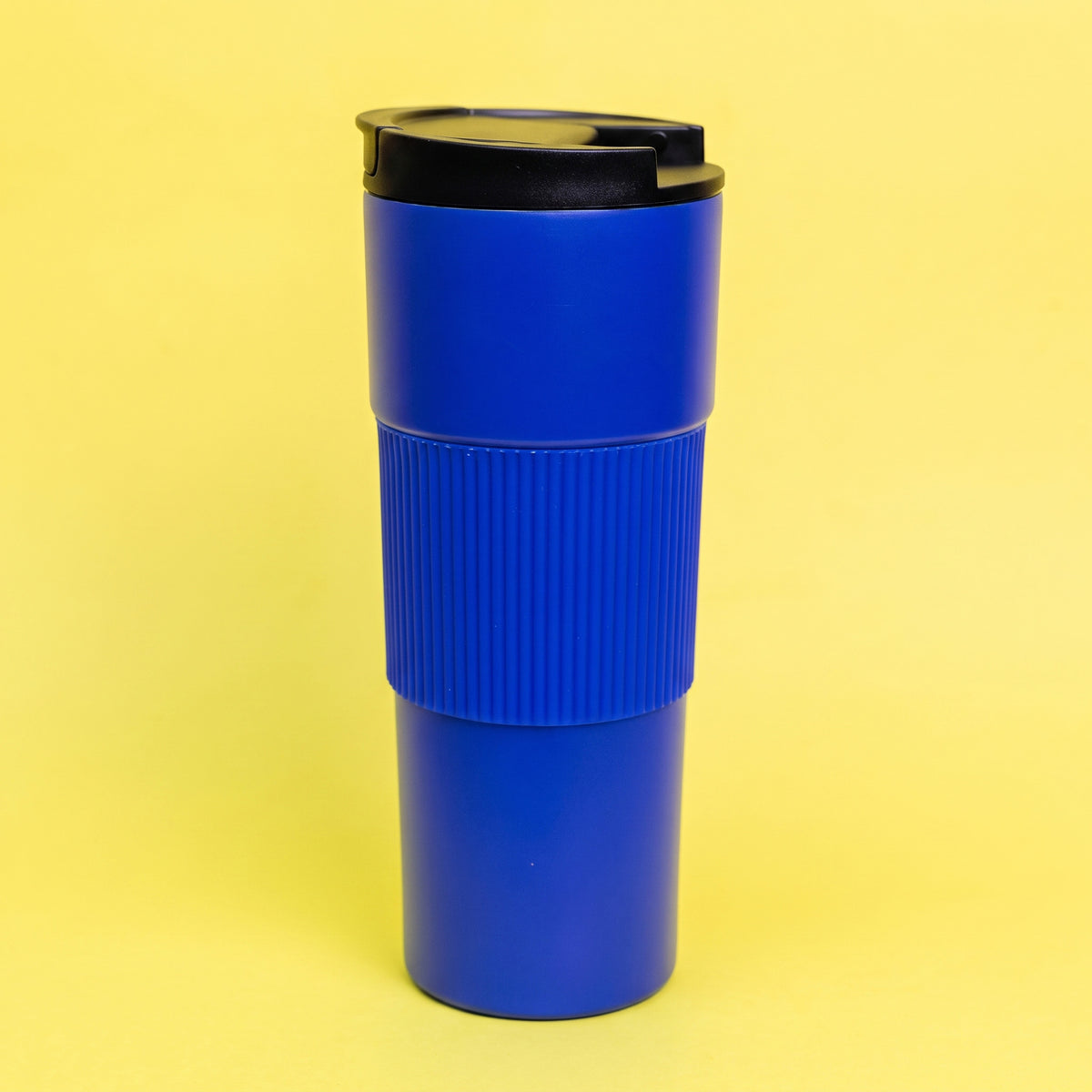 Custom laser-engraved 600ml royal blue thermal mug with ribbed silicone grip sleeve by Print365 Kenya