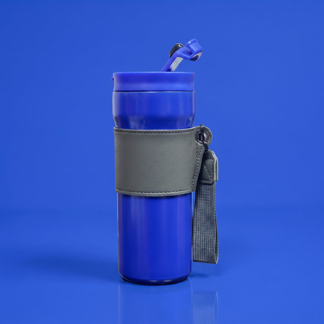 Custom laser-engraved royal blue thermal mug with stitched grey leather sleeve by Print365 Kenya