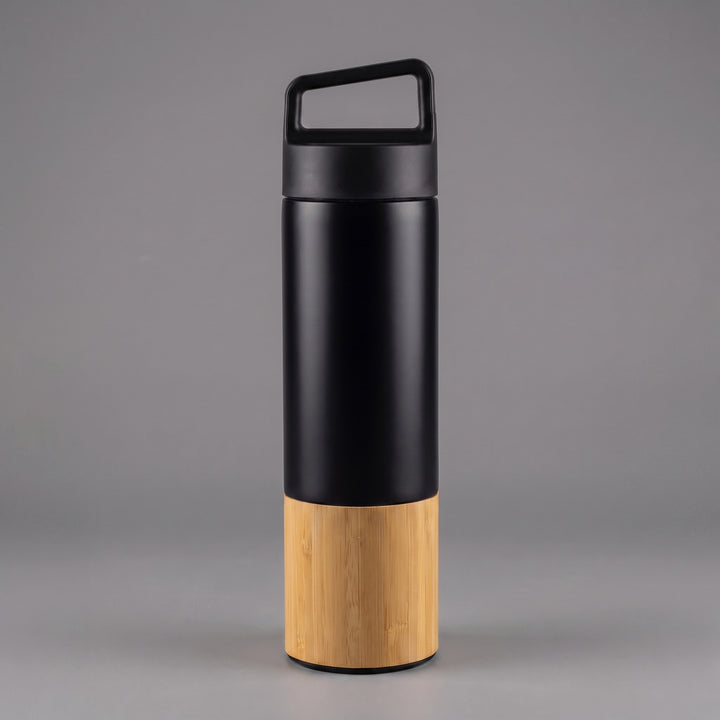 Custom laser-engraved 600ml black thermal flask with natural wooden base accent done in Nairobi Kenya