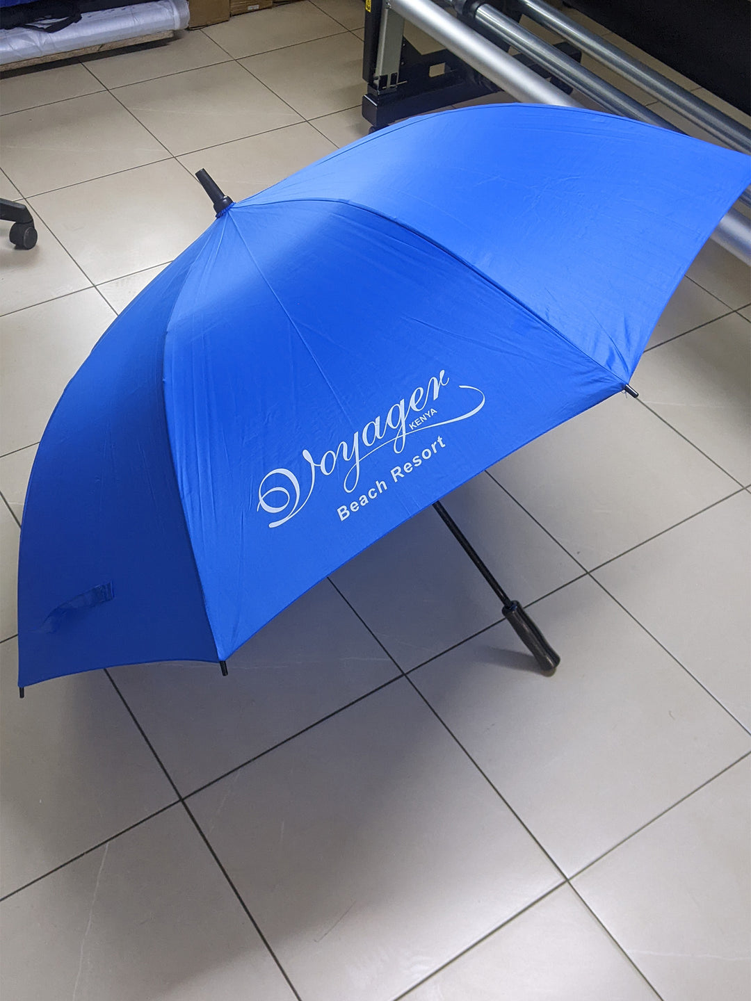 Blue umbrella with &